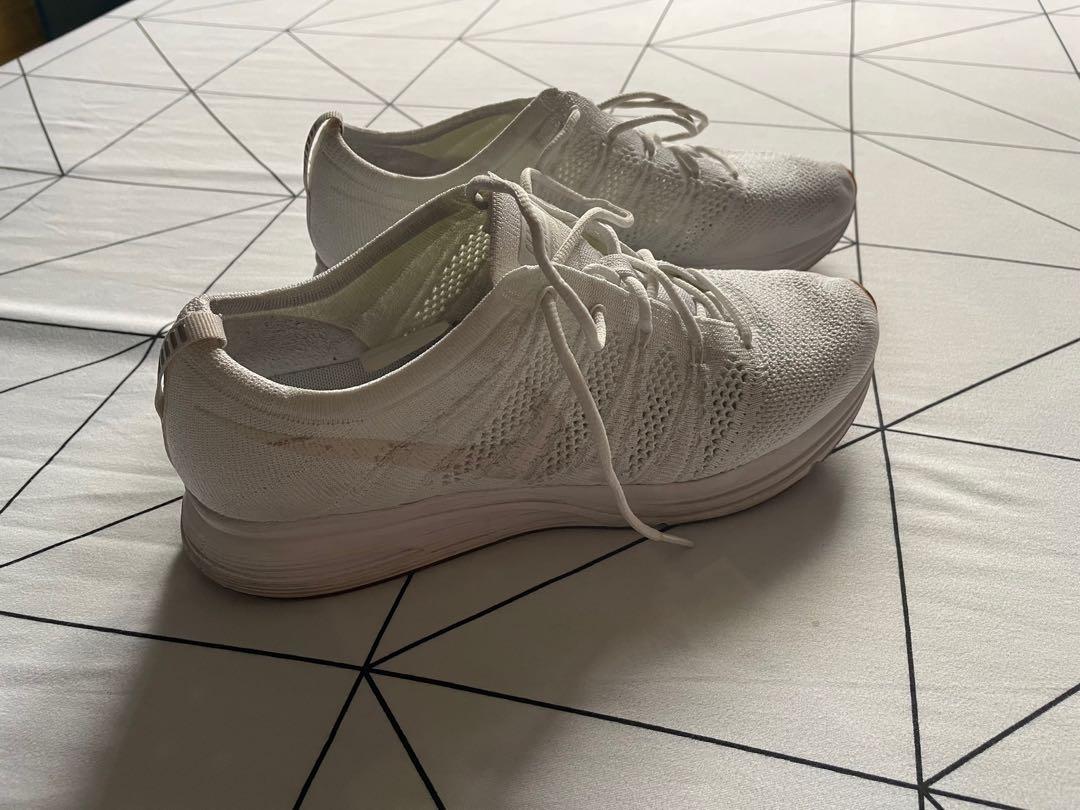 nike flyknit trainer triple white