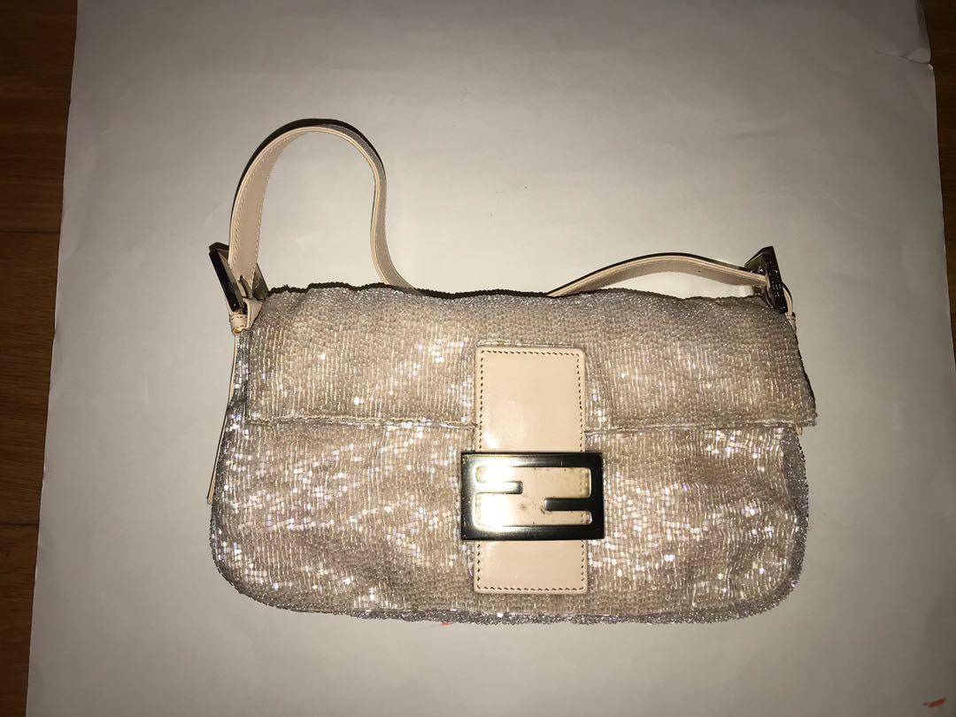 Beaded Fendi Purse (Category: Luxury Bags & Wallets) located in Taguig. Submitted by echate (Listing ID 1130416328, Image 1). Description: Never used Beaded Fendi purse Comes with original Fendi storage bag and has original sales tag. Priced according to current value (seen in last picture) .