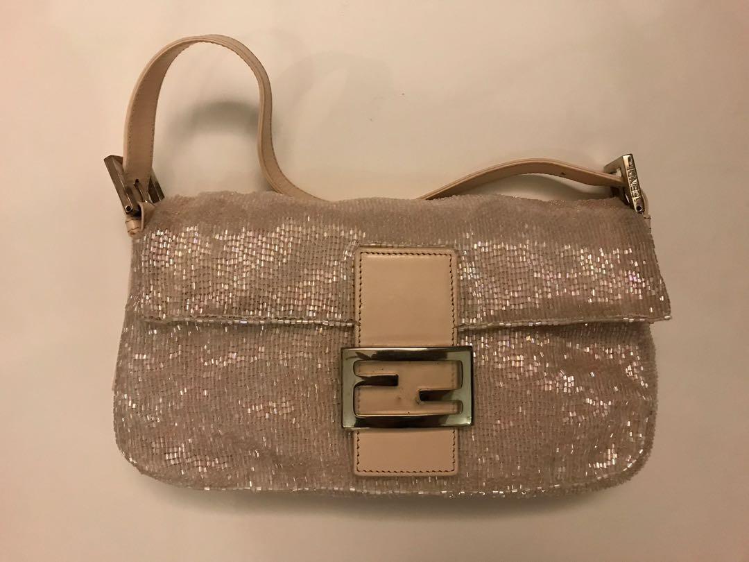 Beaded Fendi Purse (Category: Luxury Bags & Wallets) located in Taguig. Submitted by echate (Listing ID 1130416328, Image 2). Description: Never used Beaded Fendi purse Comes with original Fendi storage bag and has original sales tag. Priced according to current value (seen in last picture) .