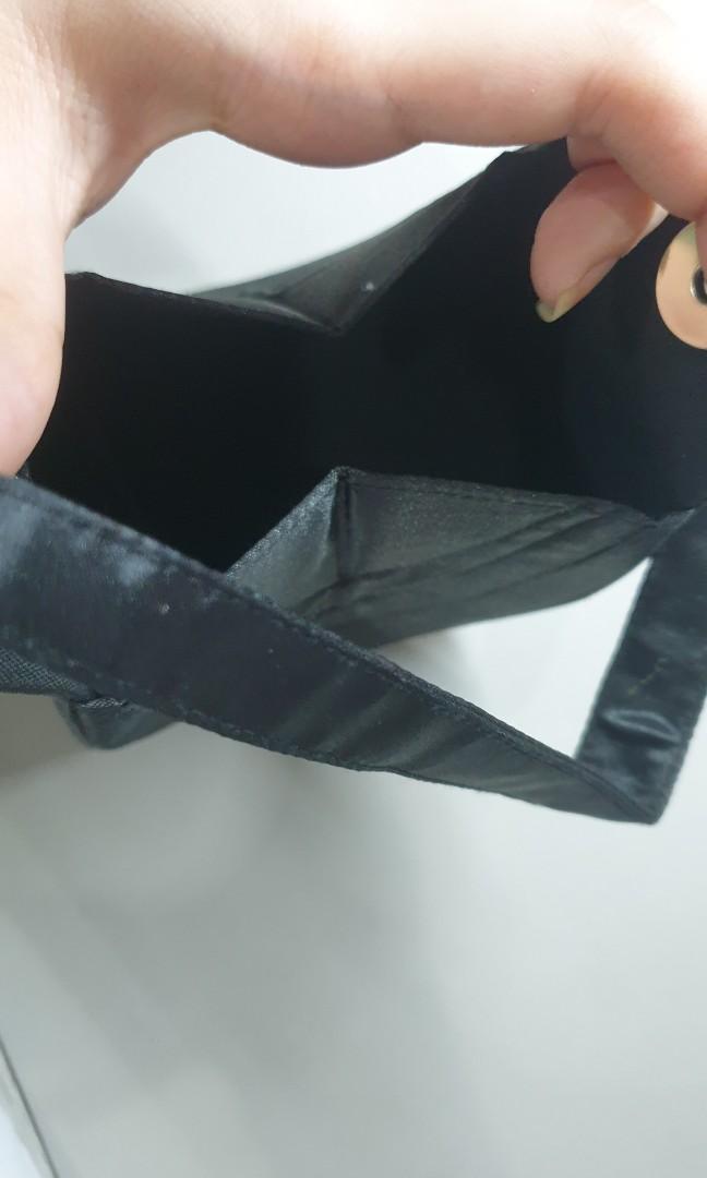 Black formal purse (Category: Clutches) located in Quezon City. Submitted by rdl09 (Listing ID 1130442318, Image 3). Description: I put it beside the aloe container for size reference. This was used once only..