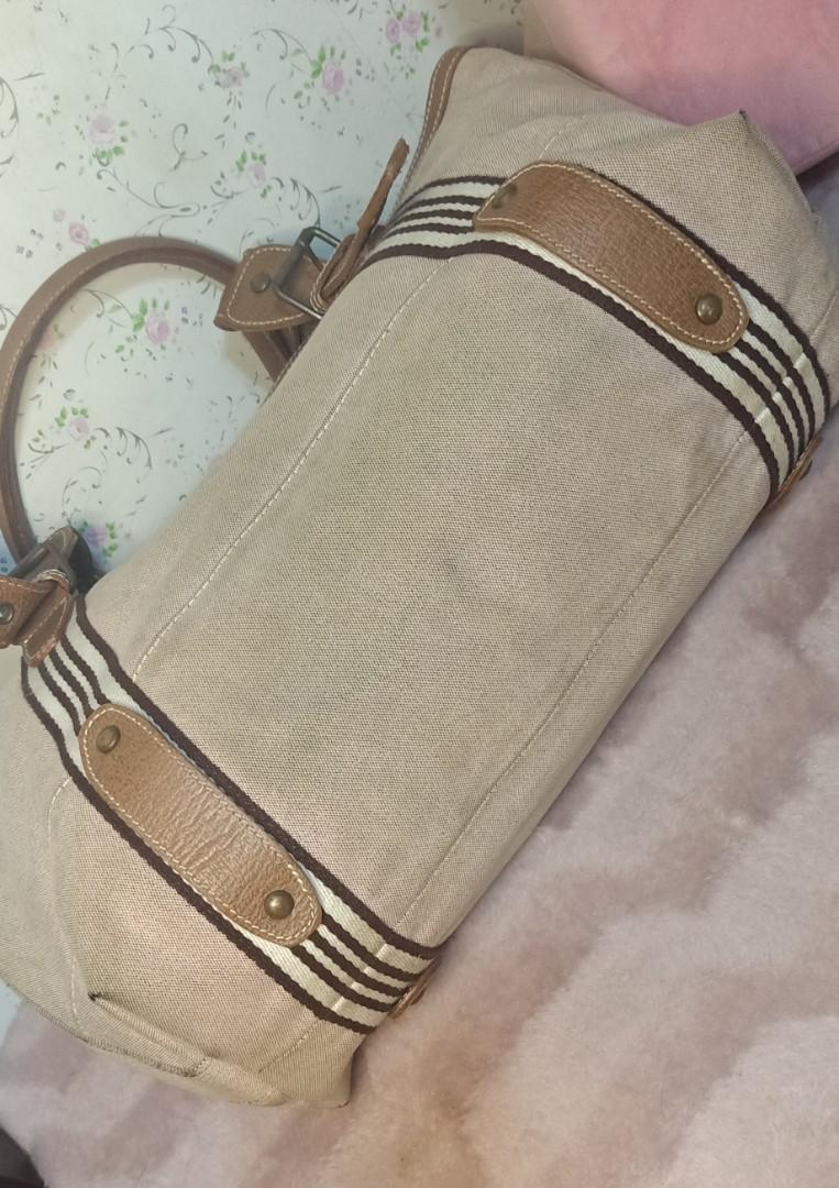 Burberry Blue Label Canvas Hand/Tote Bag (Category: Luxury Bags & Wallets) located in Caloocan City. Submitted by drum_beater (Listing ID 1130273483, Image 3). Description: Measurements:18x10x6 Large Size Thick Canvas/ Genuine Leather type brass hardwares YKK zipper engraved brand on rivets please see detailed pictures for the issues on both corners and inside as signs of usage Item is searchable online with white tag bought online at P3800+sf.