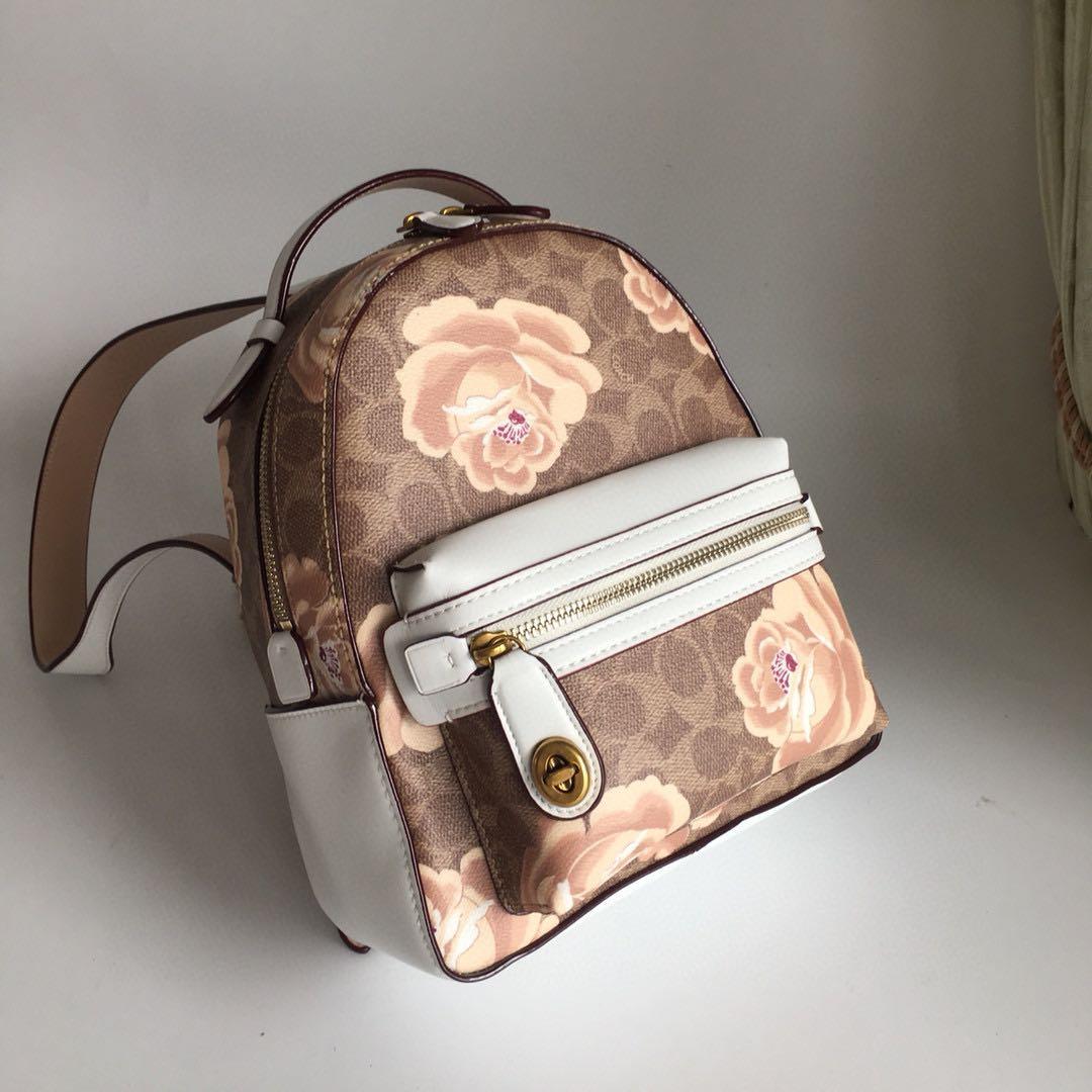 Coach backpack rose print hot sale