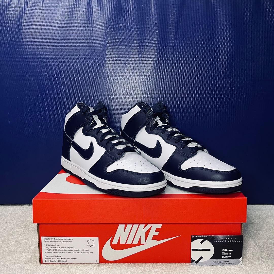 navy blue and white high top dunks