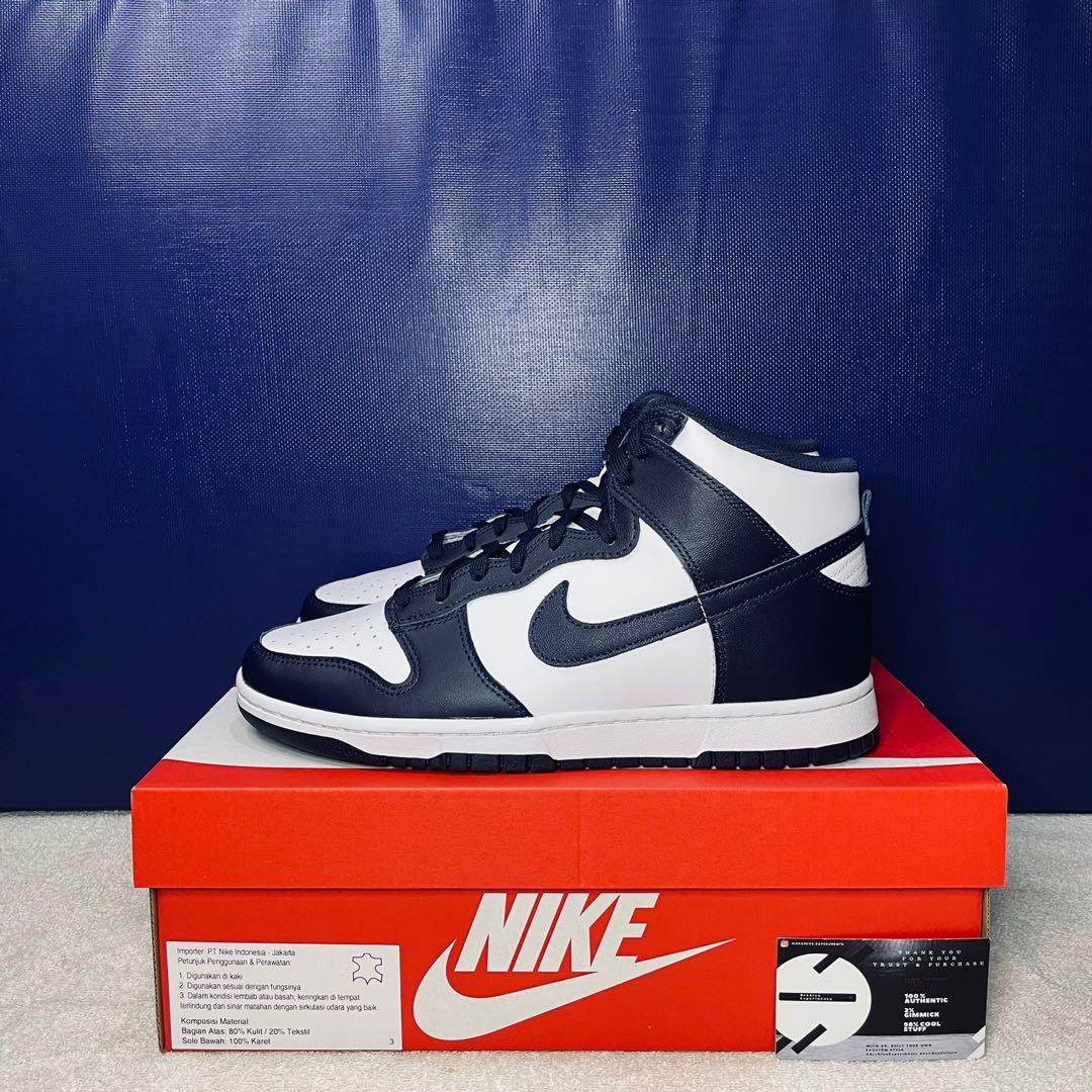 navy blue and white high top dunks
