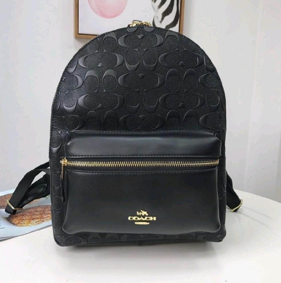 coach embossed backpack
