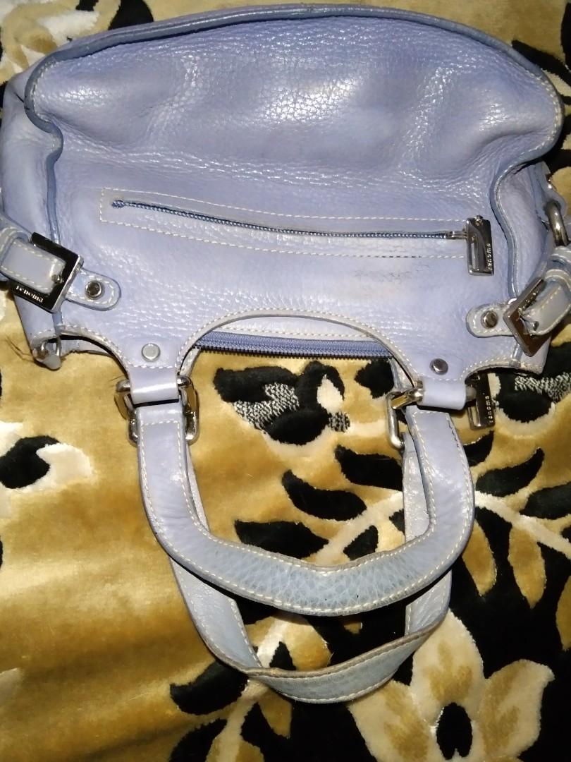 Renoma Paris Vintage Handbag (Category: Luxury Bags & Wallets) located in Manila. Submitted by cleviticus (Listing ID 1130351379, Image 3). Description: Renoma Paris Handbag. VINTAGE Leather. with etiketa, design #, YKK Zip. Faded Part due to wear & tear or storage. Dirt Stain Lining. But you can Attached Sling to other metal . No Sling Strap included See Photos..