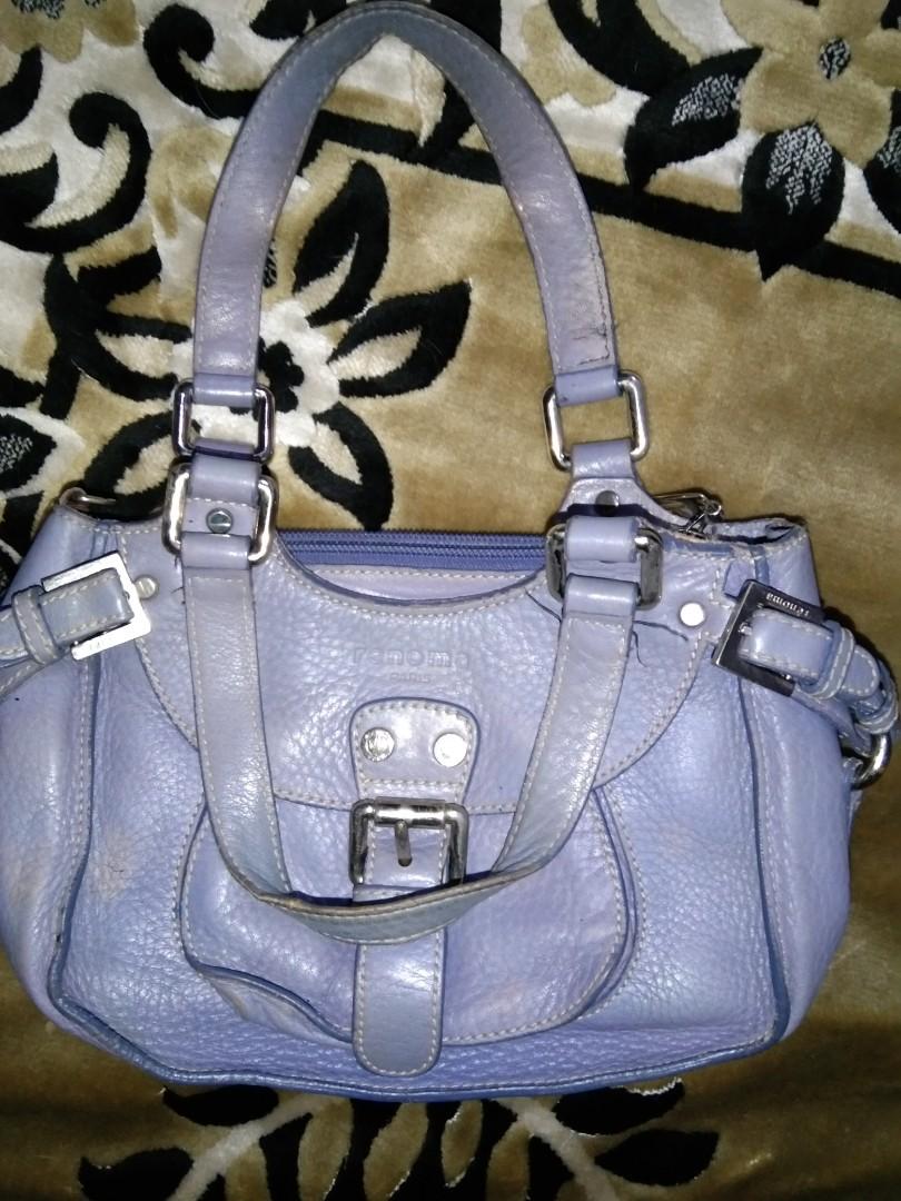 Renoma Paris Vintage Handbag (Category: Luxury Bags & Wallets) located in Manila. Submitted by cleviticus (Listing ID 1130351379, Image 1). Description: Renoma Paris Handbag. VINTAGE Leather. with etiketa, design #, YKK Zip. Faded Part due to wear & tear or storage. Dirt Stain Lining. But you can Attached Sling to other metal . No Sling Strap included See Photos..