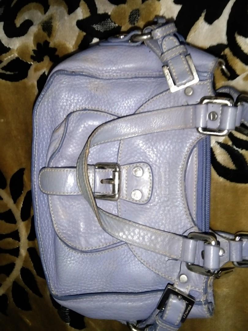 Renoma Paris Vintage Handbag (Category: Luxury Bags & Wallets) located in Manila. Submitted by cleviticus (Listing ID 1130351379, Image 2). Description: Renoma Paris Handbag. VINTAGE Leather. with etiketa, design #, YKK Zip. Faded Part due to wear & tear or storage. Dirt Stain Lining. But you can Attached Sling to other metal . No Sling Strap included See Photos..