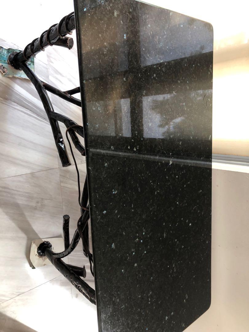 Solid granite table (Category: Tables & Sets) located in Singapore. Submitted by breadsuntalk (Listing ID 1130345218, Image 3). Description: Full granite table top with unique legs Self collection near Holland/Dover area Negotiable for fuss free deal.