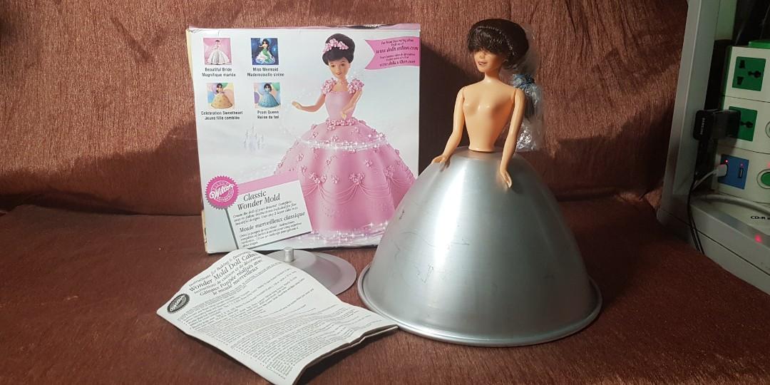 Amazon.com: Wilton Wonder Mold Doll Cake Pan Set - Create a Princess Cake  for Birthday Parties or Get Creative and Make A Volcano or Monster Cake,  Aluminum: Dolls: Home & Kitchen