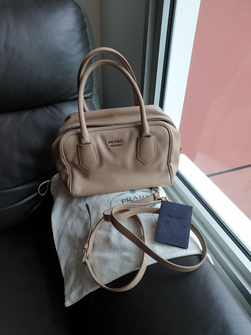 PRADA 1BB010 Leather Beige Small Handbag Sling BAG with Mini Pink Bag inside  Design, Luxury, Bags & Wallets on Carousell
