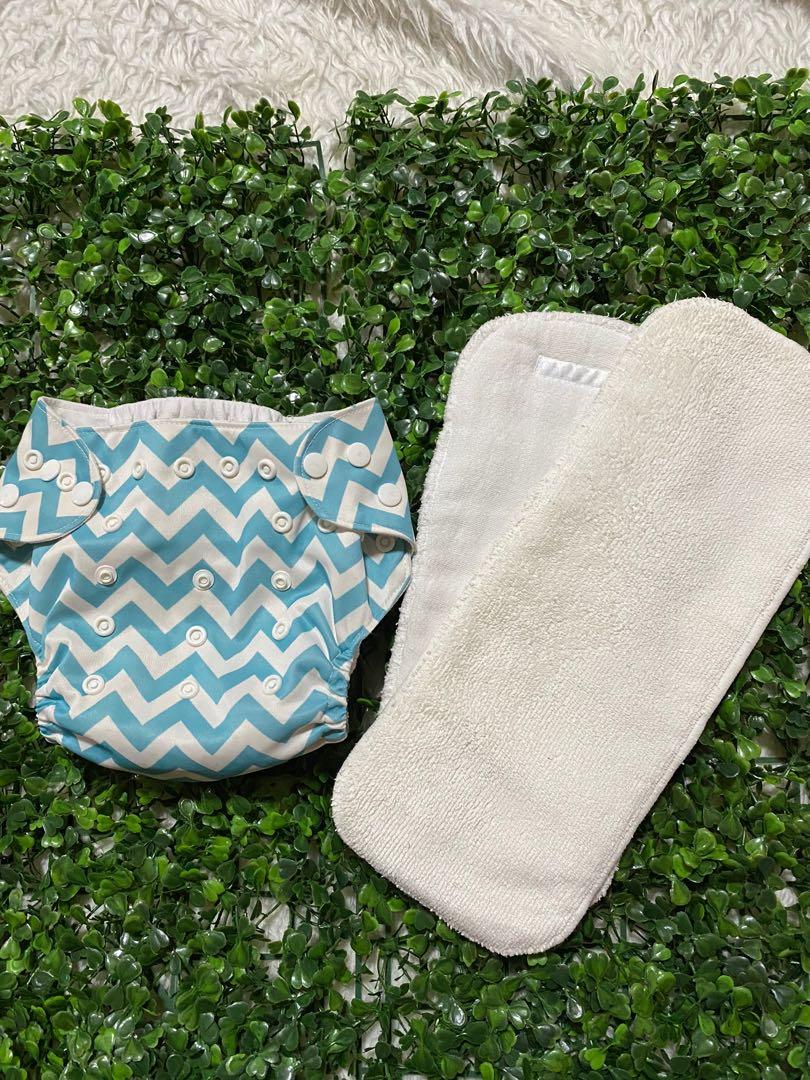 Take all cloth diapers (Category: Diapers & Baby Wipes) located in Dagupan City. Submitted by ziamarahbb (Listing ID 1130470533, Image 2). Description: Take all 8pcs cloth diaper 14pcs insert .