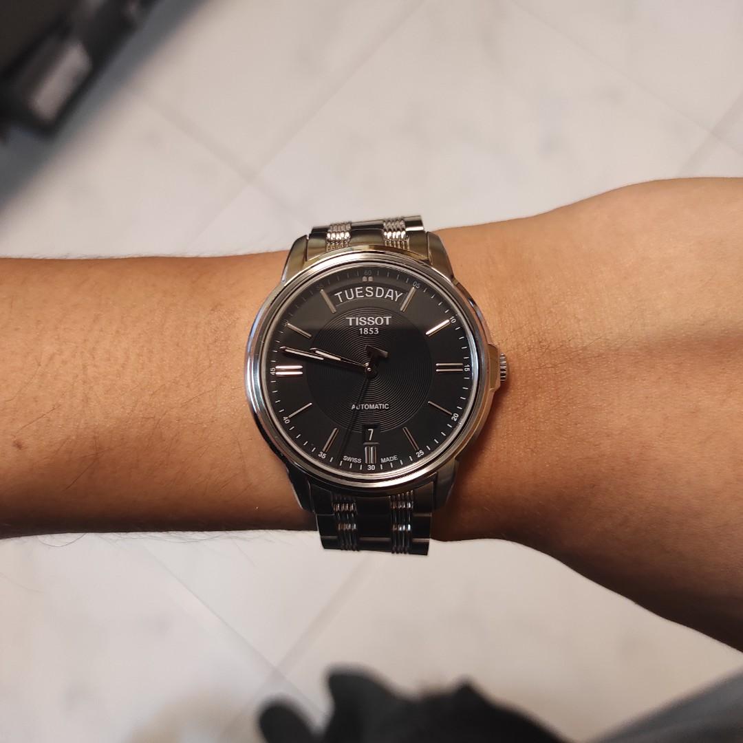 Tissot watch with outlet day and date