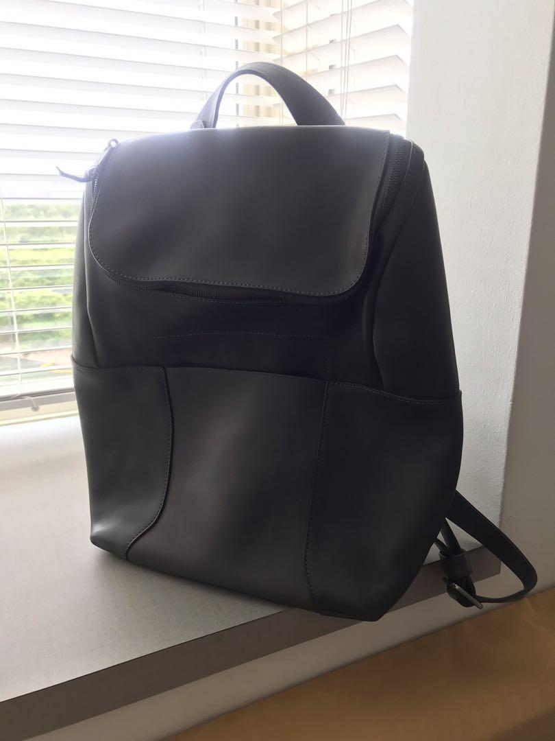 used tumi leather backpack
