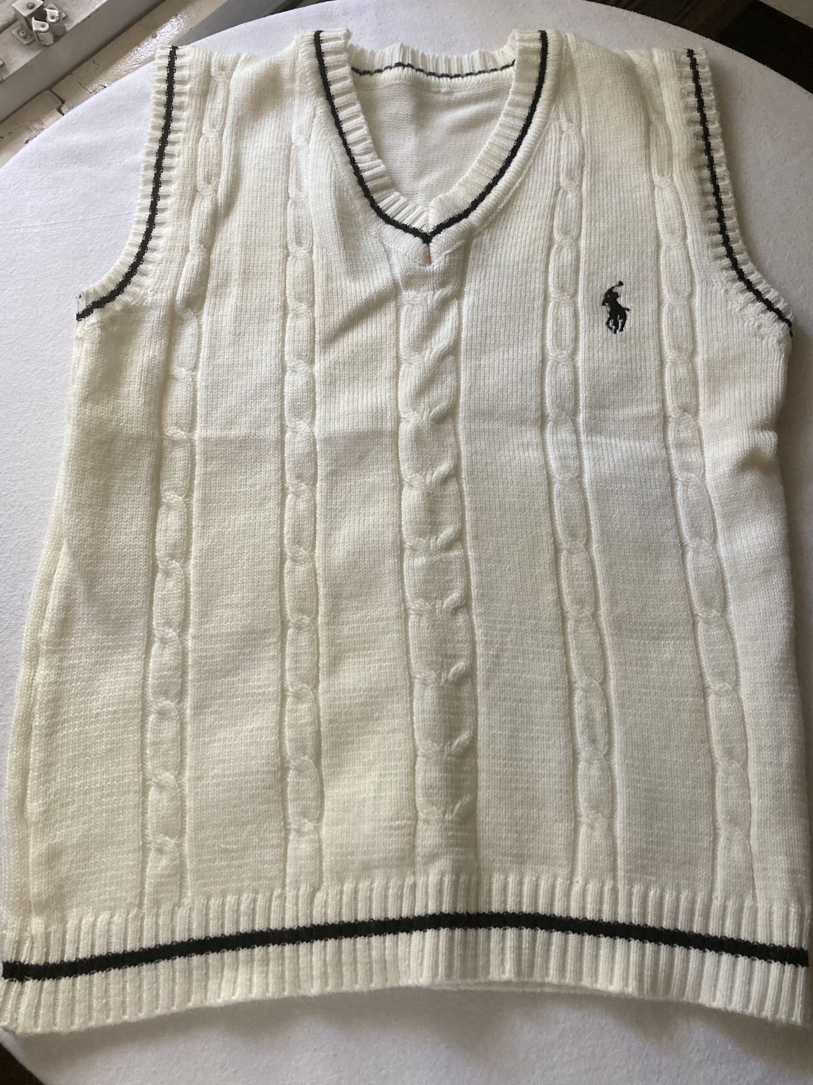 cream sweater vest