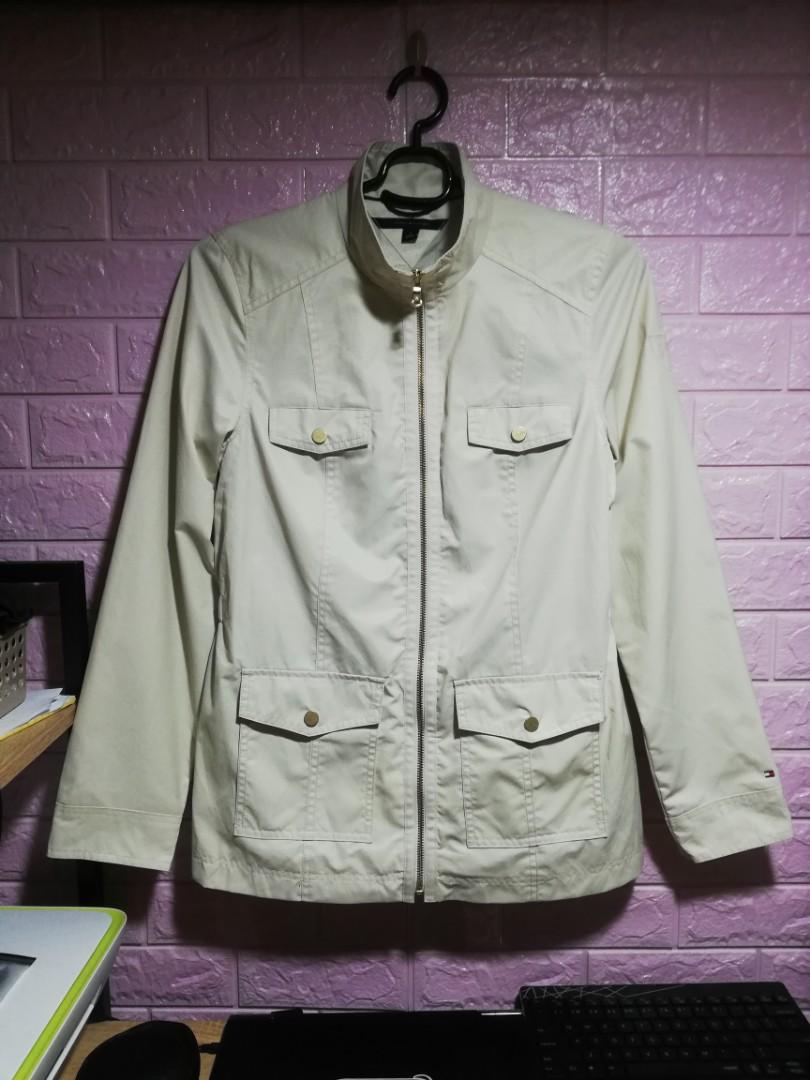 Tommy Hilfiger Windbreaker/Water Repellent (Category: Coats, Jackets and Outerwear) located in Quezon City. Submitted by drivenvf (Listing ID 1066764166, Image 2). Description: Medium Cream Color Water Repellent Light W19xL28 10/10 No Flaw Excellent Preloved.