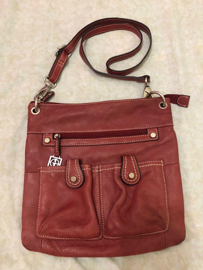 SALE!!! Authentic Giani Bernini Cross Body Bag (Category: Cross-body Bags) located in Bulacan. Submitted by le_verne (Listing ID 1068650099, Image 1). Description: Red cross body bag. Very good condition. Soft leather outer, nylon/polyester inner. Width - 11", Length - 11" Pls. manage your expectation as it is preloved. Thank you..