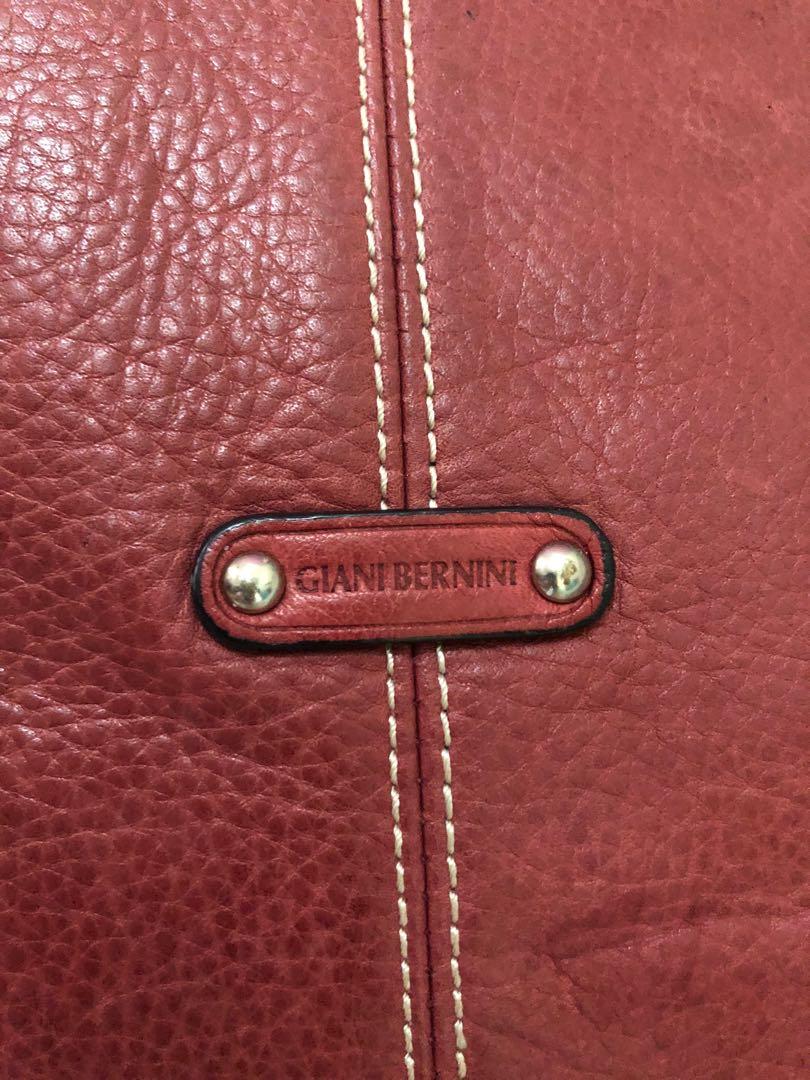 SALE!!! Authentic Giani Bernini Cross Body Bag (Category: Cross-body Bags) located in Bulacan. Submitted by le_verne (Listing ID 1068650099, Image 3). Description: Red cross body bag. Very good condition. Soft leather outer, nylon/polyester inner. Width - 11", Length - 11" Pls. manage your expectation as it is preloved. Thank you..