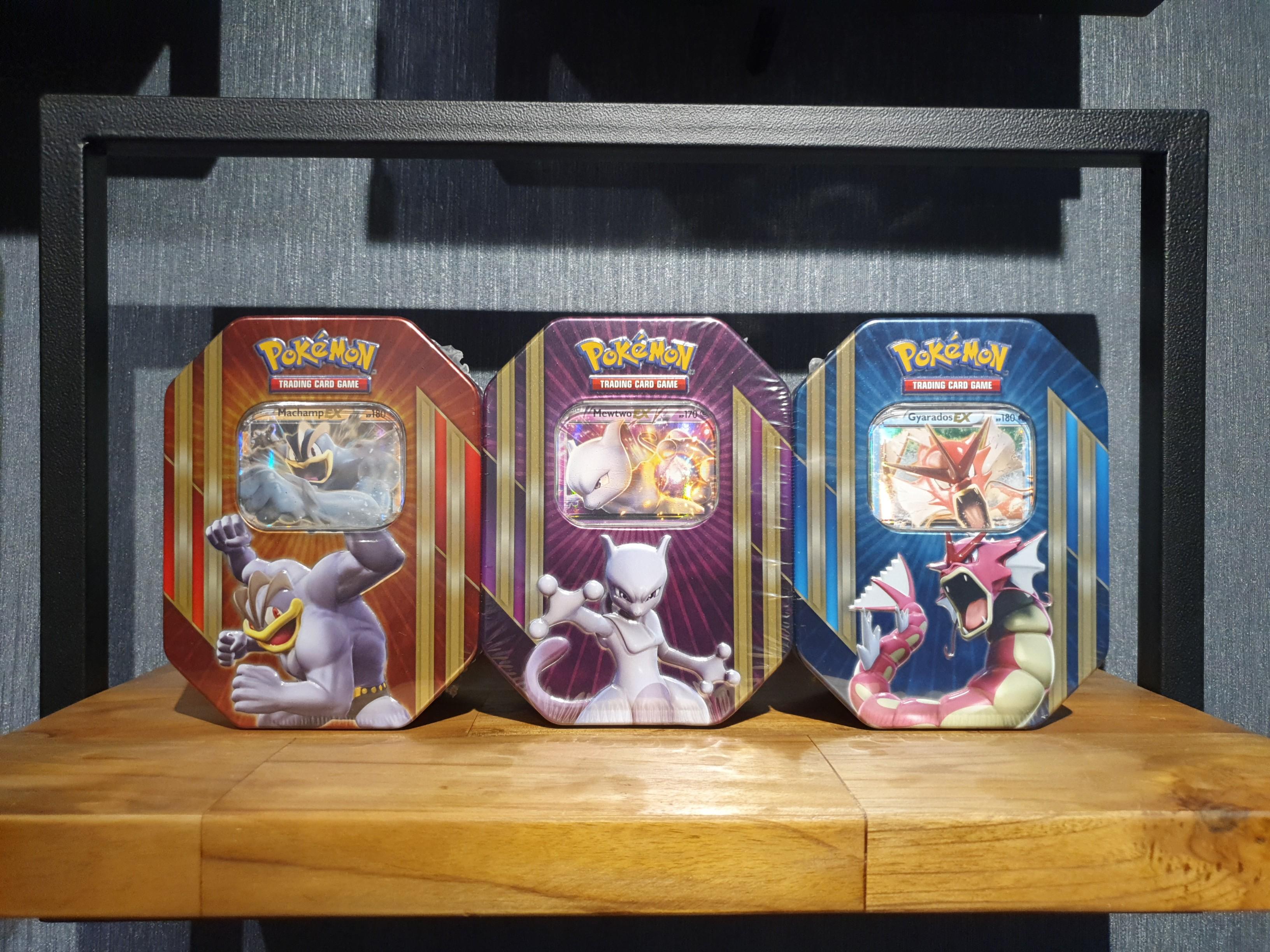  Pokemon TCG: Triple Power Collector's Pokemon Tin - Contains  Mewtwo EX, Shiny Gyarados EX OR Machamp EX, 4 Pokemon Booster Packs and  Online Code : Toys & Games