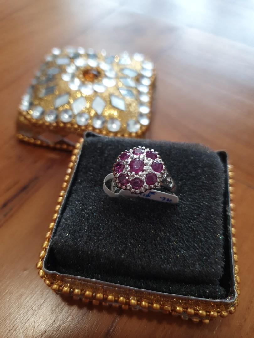 Red Ruby ring (Category: Other Accessories) located in Singapore. Submitted by precious_loots (Listing ID 1068652685, Image 1). Description: 925 silver size 6. 9 rubies..