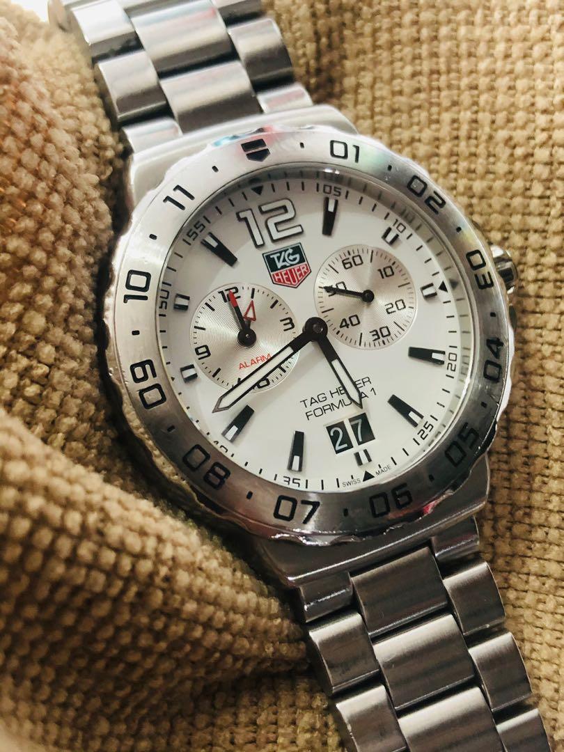 Breitling vs omega best sale vs tag heuer