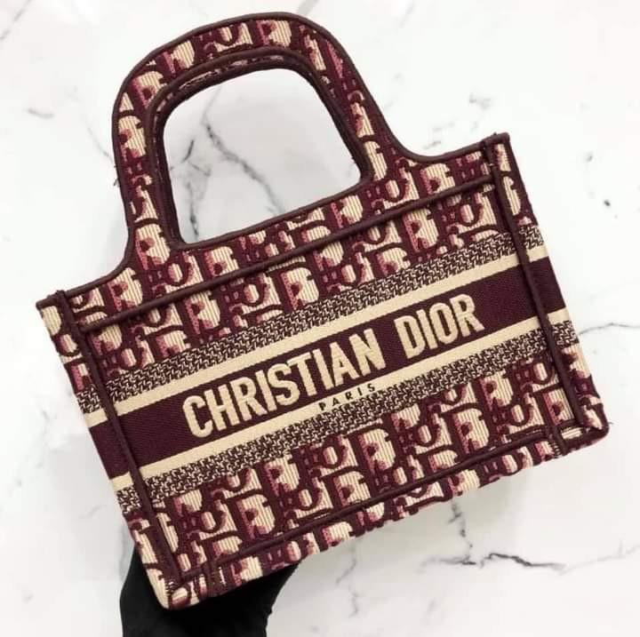 Dior Book Tote Mini Maroon Oblique (Category: Luxury Bags & Wallets) located in Carmona. Submitted by bagislifeshop (Listing ID 1068840680, Image 3). Description: CNY Sale 🔥🔥🔥 100% Authentic Dior Book Tote Mini Maroon Oblique Condition 9.5/10 Used Once Comes with Dustbag Booklet and Authenticoty Card Disclaimer: All Products, Names, Brands, and Logos are owned by their respective brand owners. We are not affiliated with the Brand featured in t