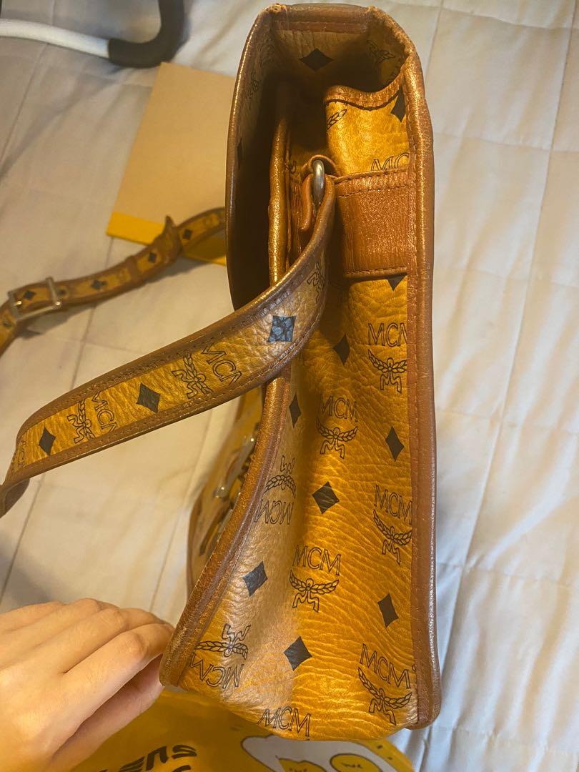 MCM Messenger bag leather (Category: Luxury Bags & Wallets) located in Quezon City. Submitted by _mnlopez (Listing ID 1068851090, Image 3). Description: Guaranteed Original MCM leather messenger bag - can fit a laptop (15in) -overall condition: 8/10 — leather condition: 9/10 — metal hardware: 8/10 Free shipping nationwide.