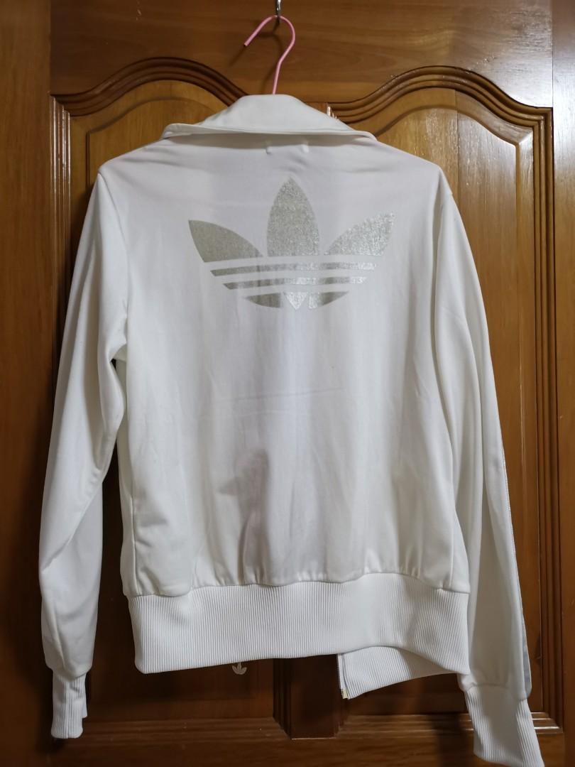 White and 2024 silver jacket