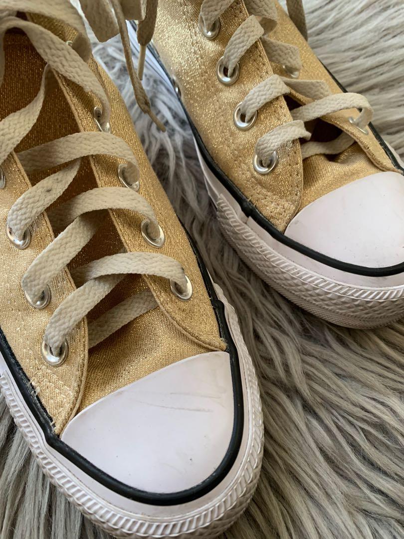 CONVERSE ALL STAR HIGH CUT (Category: Sneakers) located in Quezon City. Submitted by gprof (Listing ID 1069139002, Image 3). Description: Color/s: GOLD Design: METALLIC / GLITTER Detail/s: SNEAKERS, HIGH-CUT Condition: BARELY USED. PLEASE MANAGE EXPECTATIONS FOR BARELY USED/USED ITEMS. SOLES ARE IN TACT. THANK YOU. 5 / 35 Women Original Price: Around ₱2000 BOUGHT FROM NEW ZEALAND. .