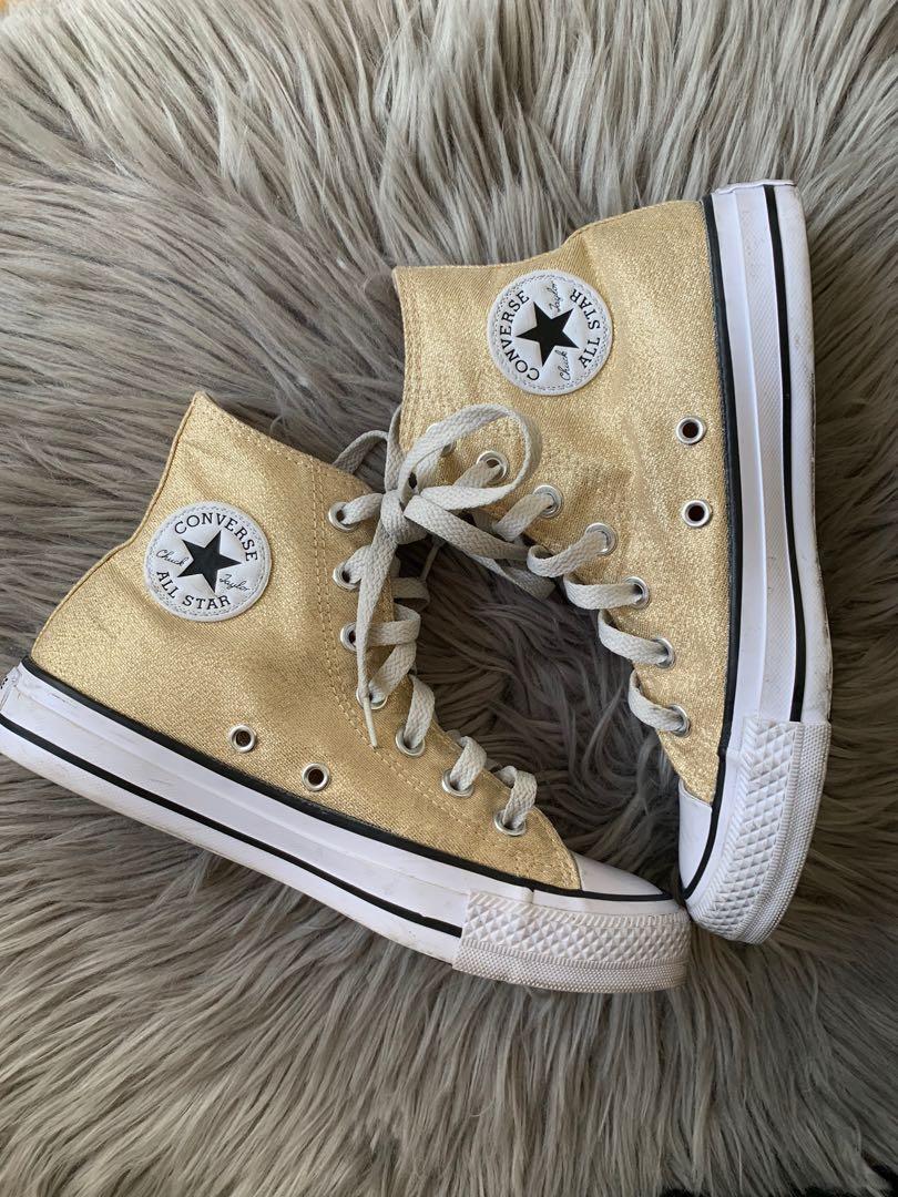 CONVERSE ALL STAR HIGH CUT (Category: Sneakers) located in Quezon City. Submitted by gprof (Listing ID 1069139002, Image 2). Description: Color/s: GOLD Design: METALLIC / GLITTER Detail/s: SNEAKERS, HIGH-CUT Condition: BARELY USED. PLEASE MANAGE EXPECTATIONS FOR BARELY USED/USED ITEMS. SOLES ARE IN TACT. THANK YOU. 5 / 35 Women Original Price: Around ₱2000 BOUGHT FROM NEW ZEALAND. .