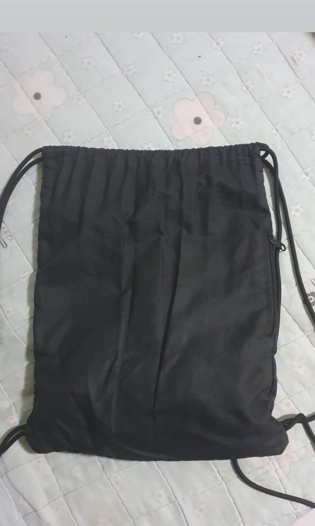 Puma drawstring bag (Category: Belt bags, Clutches and Pouches) located in Singapore. Submitted by harithaqiib (Listing ID 1069149240, Image 2). Description: Good condition and little scratch mark on logo..