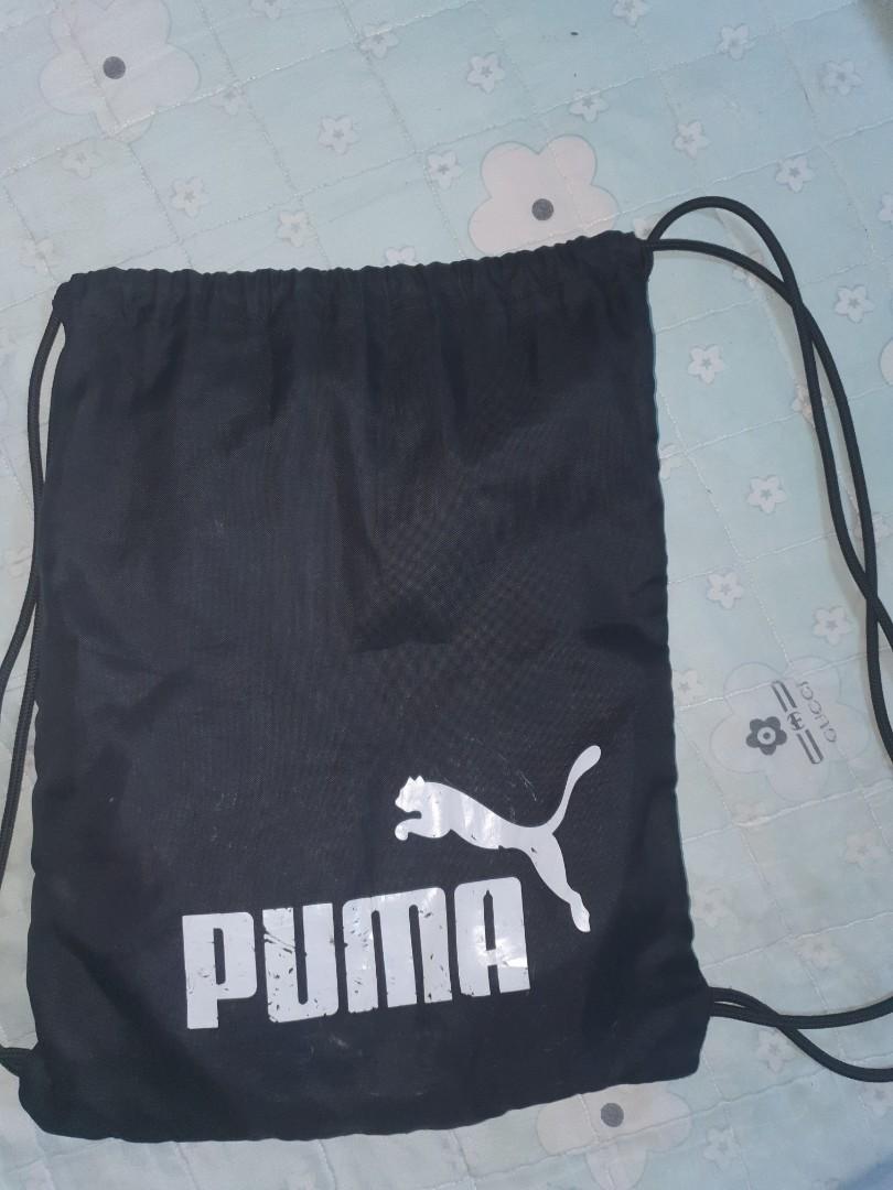 Puma drawstring bag (Category: Belt bags, Clutches and Pouches) located in Singapore. Submitted by harithaqiib (Listing ID 1069149240, Image 1). Description: Good condition and little scratch mark on logo..