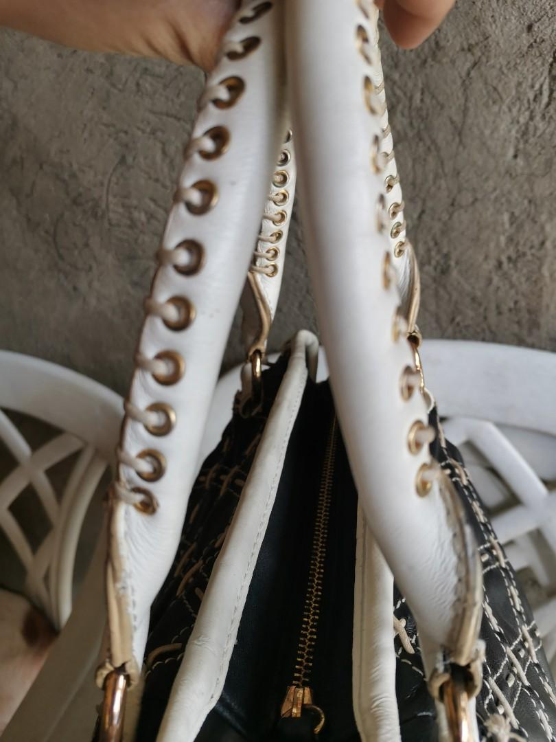 Vintage Miu Miu hobo bag (Category: Luxury Bags & Wallets) located in Quezon City. Submitted by emsparkle (Listing ID 1069038867, Image 3). Description: Sign of usage only Minimal flaws which are not noticeable nmn.