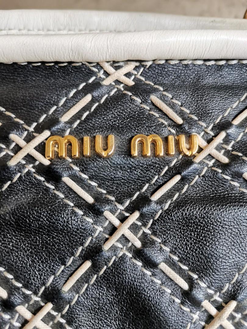 Vintage Miu Miu hobo bag (Category: Luxury Bags & Wallets) located in Quezon City. Submitted by emsparkle (Listing ID 1069038867, Image 2). Description: Sign of usage only Minimal flaws which are not noticeable nmn.