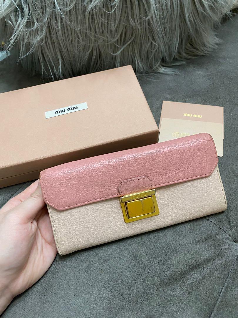Authentic Miu Miu Pink & Beige Long Leather Wallet (Category: Luxury Bags & Wallets) located in Makati City. Submitted by cindiorella (Listing ID 1069270176, Image 2). Description: 100% guaranteed authentic W/ complete inclusions (box & authenticity card) Selling low! 💗.
