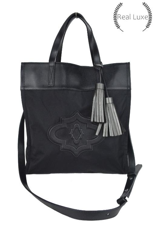 New ORYANY black leather tassle two way bag (Category: Luxury Bags & Wallets) located in Cagayan de Oro. Submitted by real_luxe (Listing ID 1069318939, Image 2). Description: No Inclusion ( Encircled ones are the flaws of the item ) The Photos are taken by "US" and water mark on all images to avoid people taking our hard work. We take a lot of photos already with good quality, so hoping you wont ask for more as my time is very limited because of 