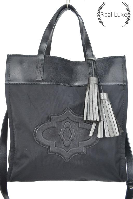 New ORYANY black leather tassle two way bag (Category: Luxury Bags & Wallets) located in Cagayan de Oro. Submitted by real_luxe (Listing ID 1069318939, Image 1). Description: No Inclusion ( Encircled ones are the flaws of the item ) The Photos are taken by "US" and water mark on all images to avoid people taking our hard work. We take a lot of photos already with good quality, so hoping you wont ask for more as my time is very limited because of 