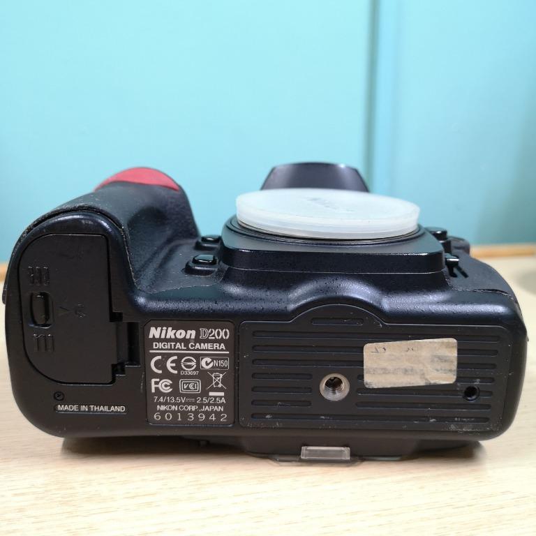 Nikon D200 Camera Body (Category: Cameras) located in Cainta. Submitted by mikodv (Listing ID 1069181532, Image 3). Description: For Sale: Nikon D200 Camera Body (bargain) - digital SLR camera body; no lens - working with signs of use - please see photos for best description - issues: missing cover for USB connector, white marks on top LCD, and grip cover not sticking - bought brand new; first owner - complete with original box, CD, 2 compact fla