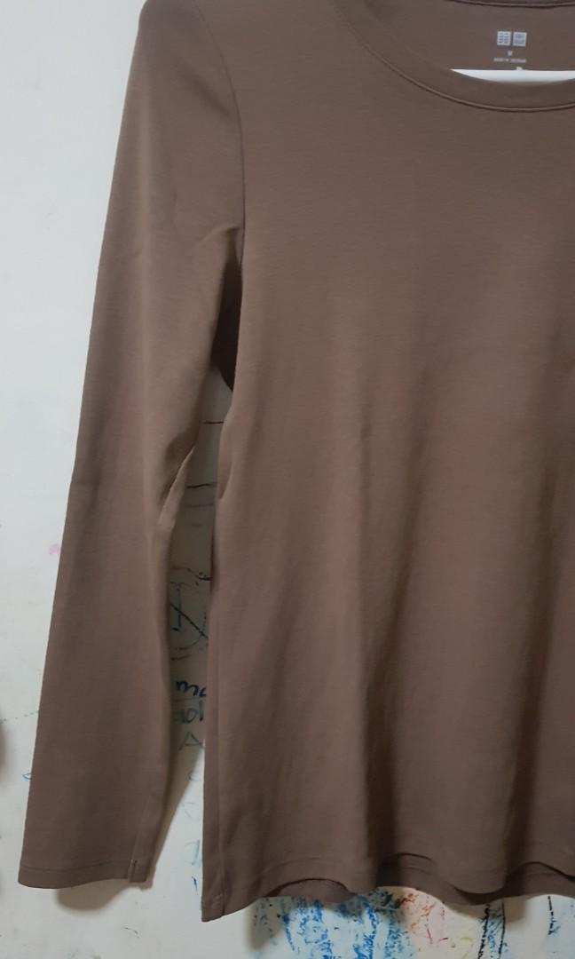Uniqlo shirt (Category: Shirts) located in Quezon City. Submitted by bons83 (Listing ID 1069317857, Image 2). Description: worn once in excellent condition.