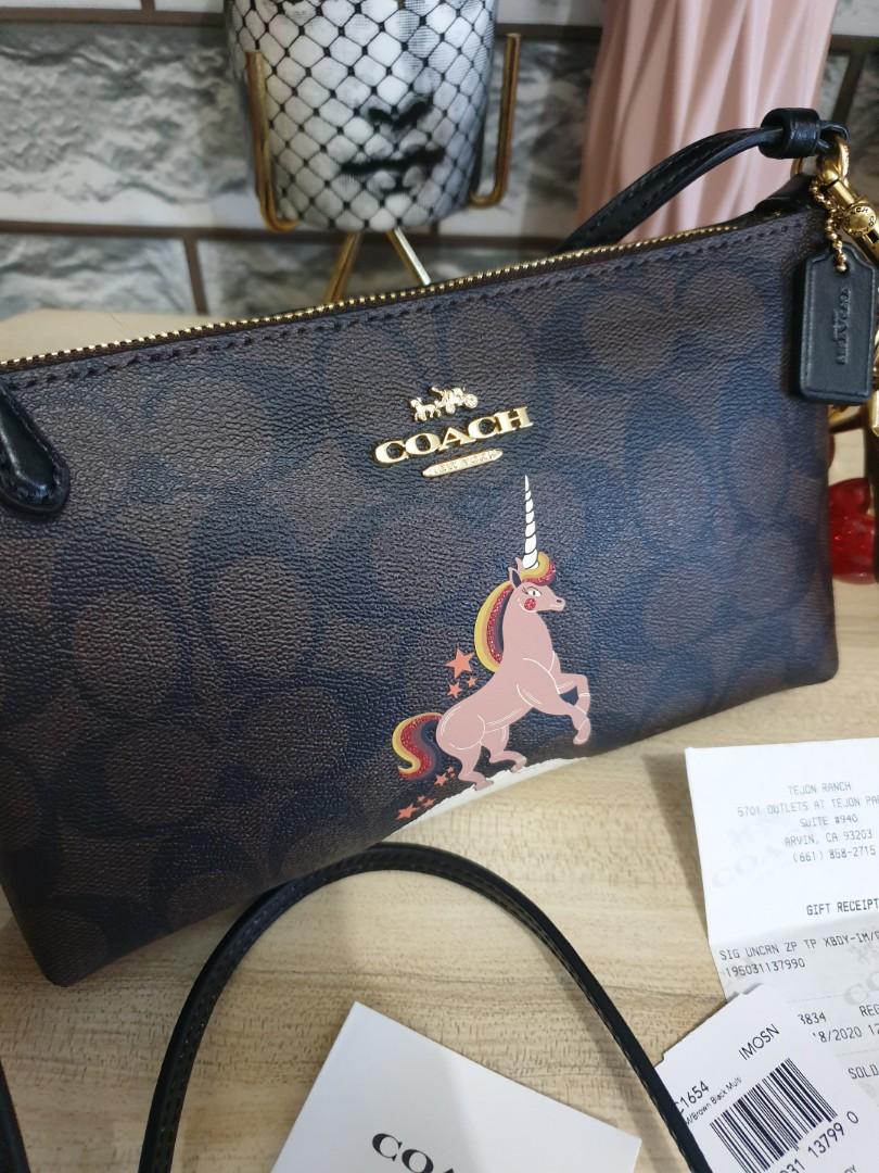 Zip top crossbody in signature canvas with unicorn 2025