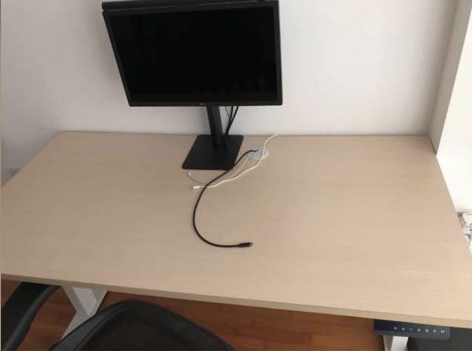 Height adjustable table (Category: Tables & Sets) located in Singapore. Submitted by wearthepants (Listing ID 1069372025, Image 2). Description: - 1+ year old, - Lightly used, - Minor scuffs on table leg - Table size- 140x70cm - Quiet dual motor with 4 memory height selection (similar to omnidesk) - Great for WFH setup Selling as moving to new house soon and wife thinks will not suit room design. Feel free to test table motor before purchase. Buy