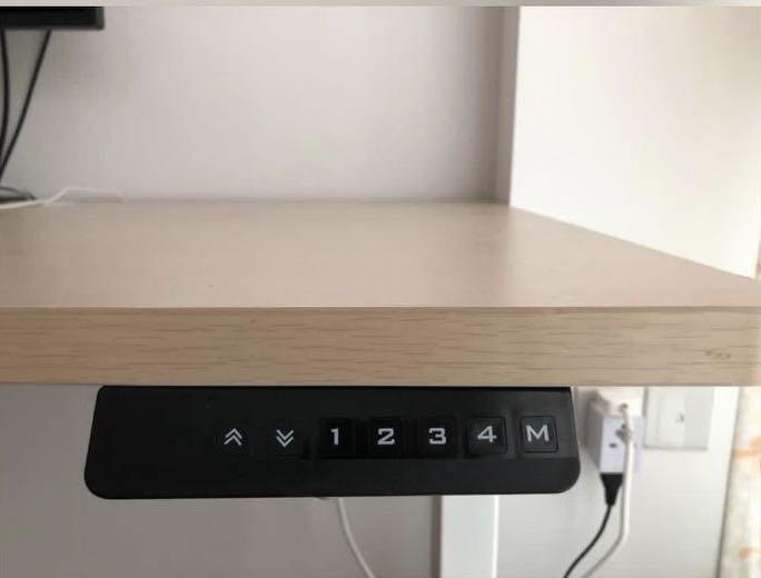 Height adjustable table (Category: Tables & Sets) located in Singapore. Submitted by wearthepants (Listing ID 1069372025, Image 3). Description: - 1+ year old, - Lightly used, - Minor scuffs on table leg - Table size- 140x70cm - Quiet dual motor with 4 memory height selection (similar to omnidesk) - Great for WFH setup Selling as moving to new house soon and wife thinks will not suit room design. Feel free to test table motor before purchase. Buy