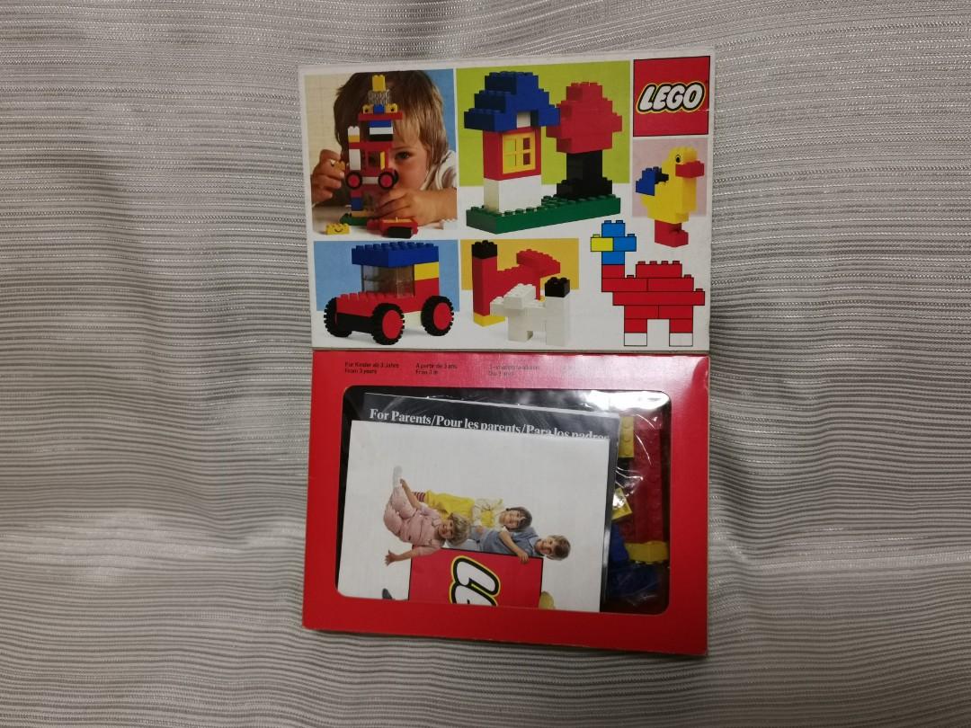 Lego vintage basic set 1983 (Category: Lego & Building Sets) located in Singapore. Submitted by konkers (Listing ID 1069463012, Image 5). Description: - Opened but intact box. Paper tear at one side, tape on other side is intact. - box is yellowed from age but still strong. - Inner bag has been opened but present. - both very rare original catalog + parent's guidebook intact. - all lego pieces accounted for, no missing parts. Pick up from punggol