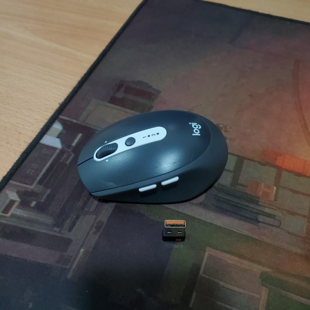 M585 Multi Device Logitech Mouse (Category: Mouse & Mousepads) located in Kuala Lumpur. Submitted by husseinriz (Listing ID 1069469104, Image 1). Description: Condition 8.5, selling to upgrade. Can connect up to 2 multiple device. USB donggle and Bluetooth. 7 programmable clicks..