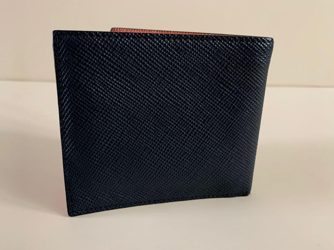 Prada Wallet (Category: Wallets & Card Holders) located in Singapore. Submitted by xliminx (Listing ID 1069375445, Image 2). Description: Prada wallet. Condition 8/10.