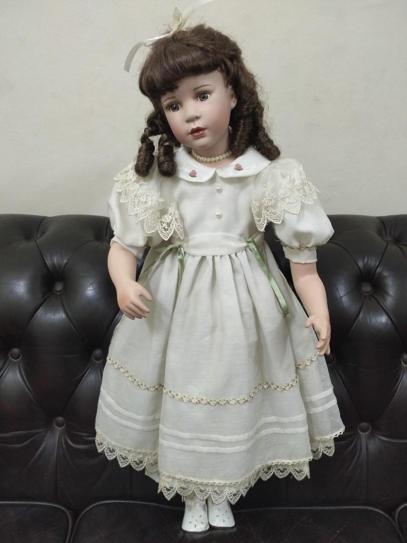Big porcelain dolls best sale