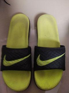 buy nike slippers at 50 off