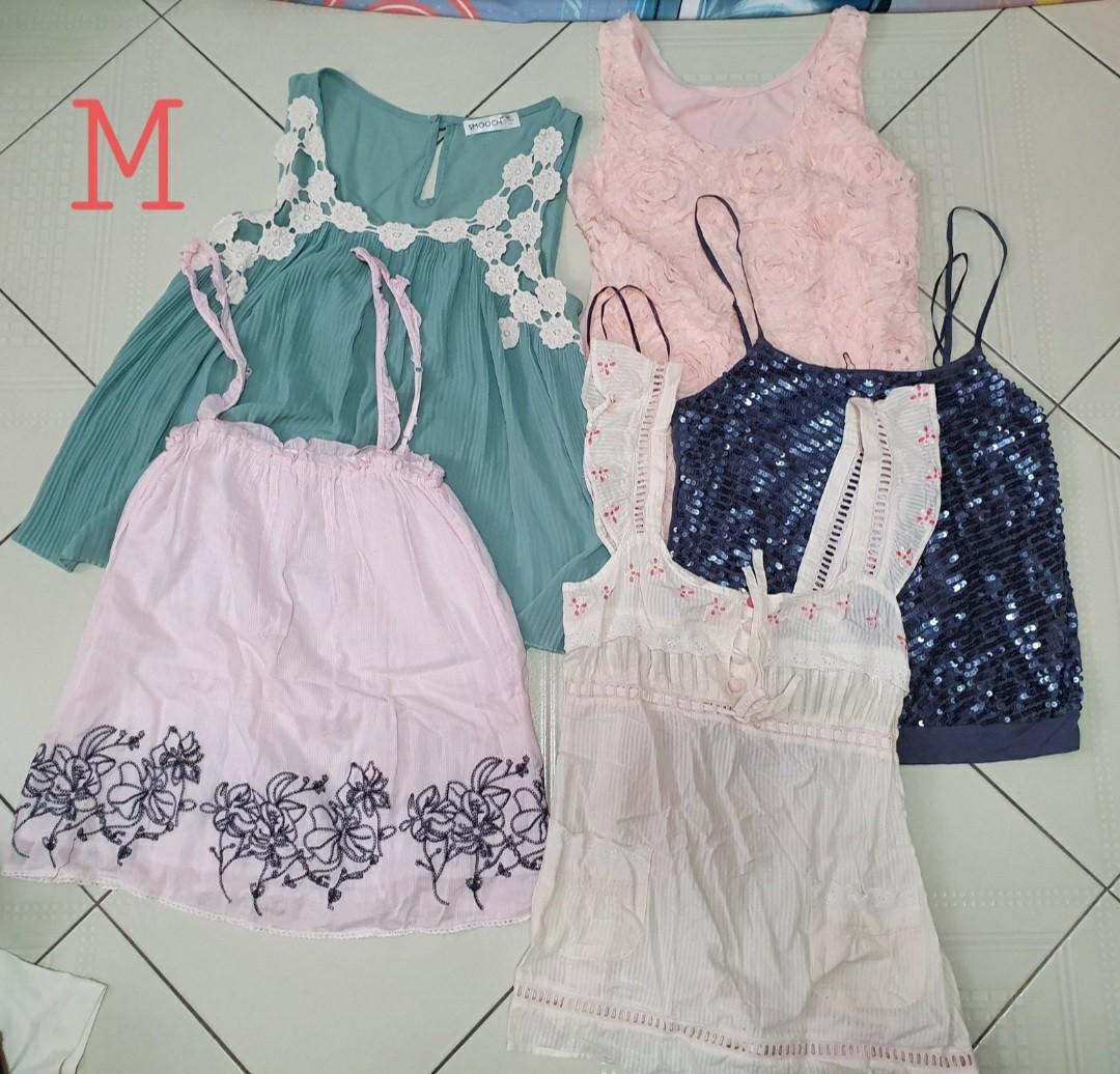 Bundle M (Category: Other Tops) located in Singapore. Submitted by sushiwu (Listing ID 1069511413, Image 1). Description: To be sold as a bundle. $10 only, non negotiable. clearing out my wardrobe. some used, some new. will fit size small and medium not for fussy buyers. self collection only. location to be advised..