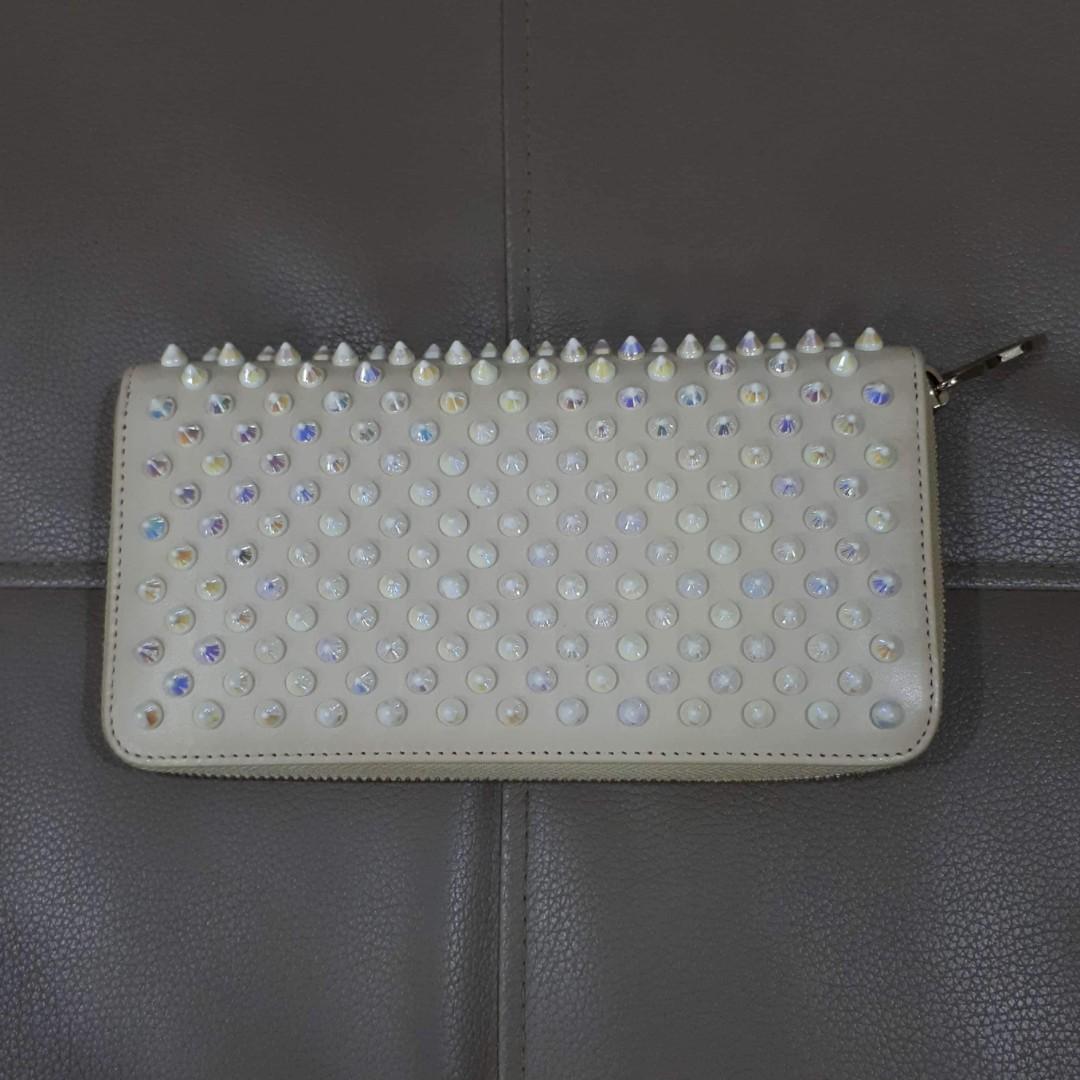 Christian Louboutin Ivory Panettone Wallet (Category: Luxury Bags & Wallets) located in Taguig. Submitted by esa.agustin (Listing ID 1069677544, Image 2). Description: Original Christian Louboutin Pannetone wallet. Complete inclusion - box, dust bag, carecard and authenticity card. Made in Italy..