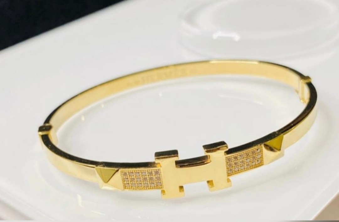 Hermes gold hotsell bangle bracelet